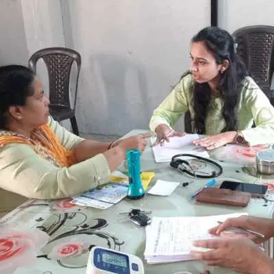 Dr. Chaitali doing consultation at Health camp at Pimpri