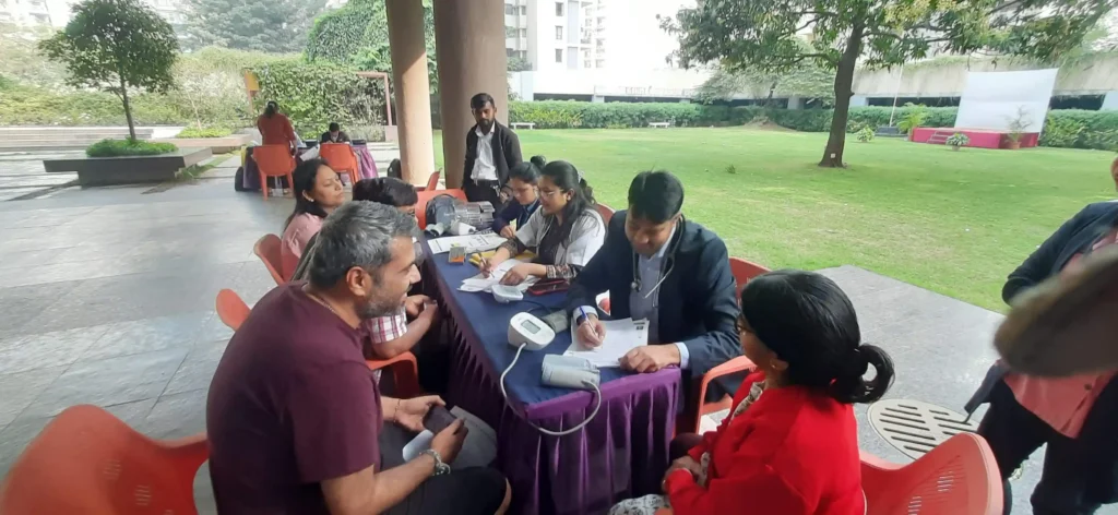 Dr. Mayuresh leading the health camp at Mahindra Antheia, Pimpri