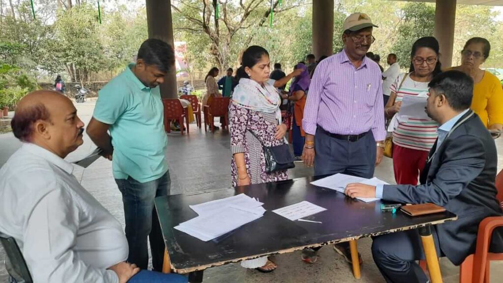 Residents of Mahindra Antheia doing registration in Health camp