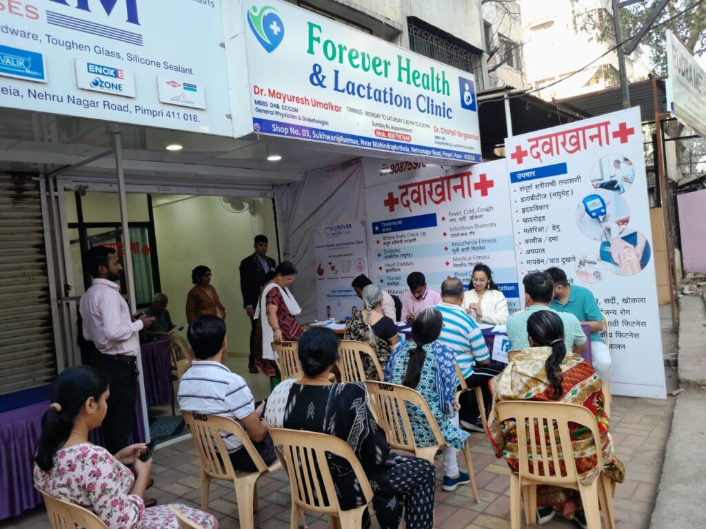 Residents of Mahindra Antheia doing registration in Health camp at Forever Health and Lactation Clinic, Pimpri Chinchwad