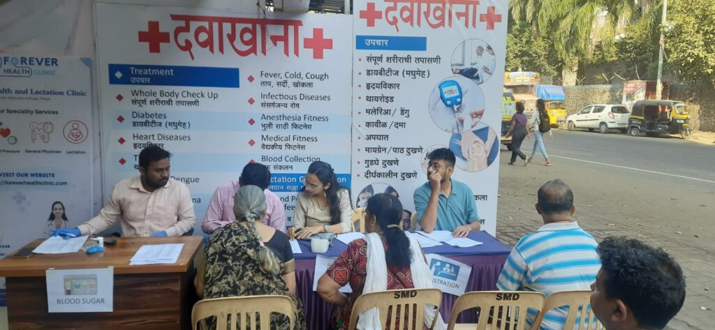 Residents of Mahindra Antheia doing registration in Health camp at Forever Health and Lactation Clinic, Pimpri Chinchwad