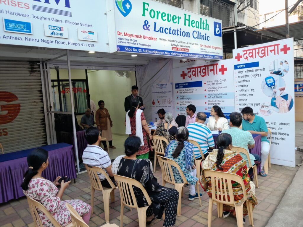 Residents of Mahindra Antheia doing registration in Health camp at Forever Health and Lactation Clinic, Pimpri Chinchwad